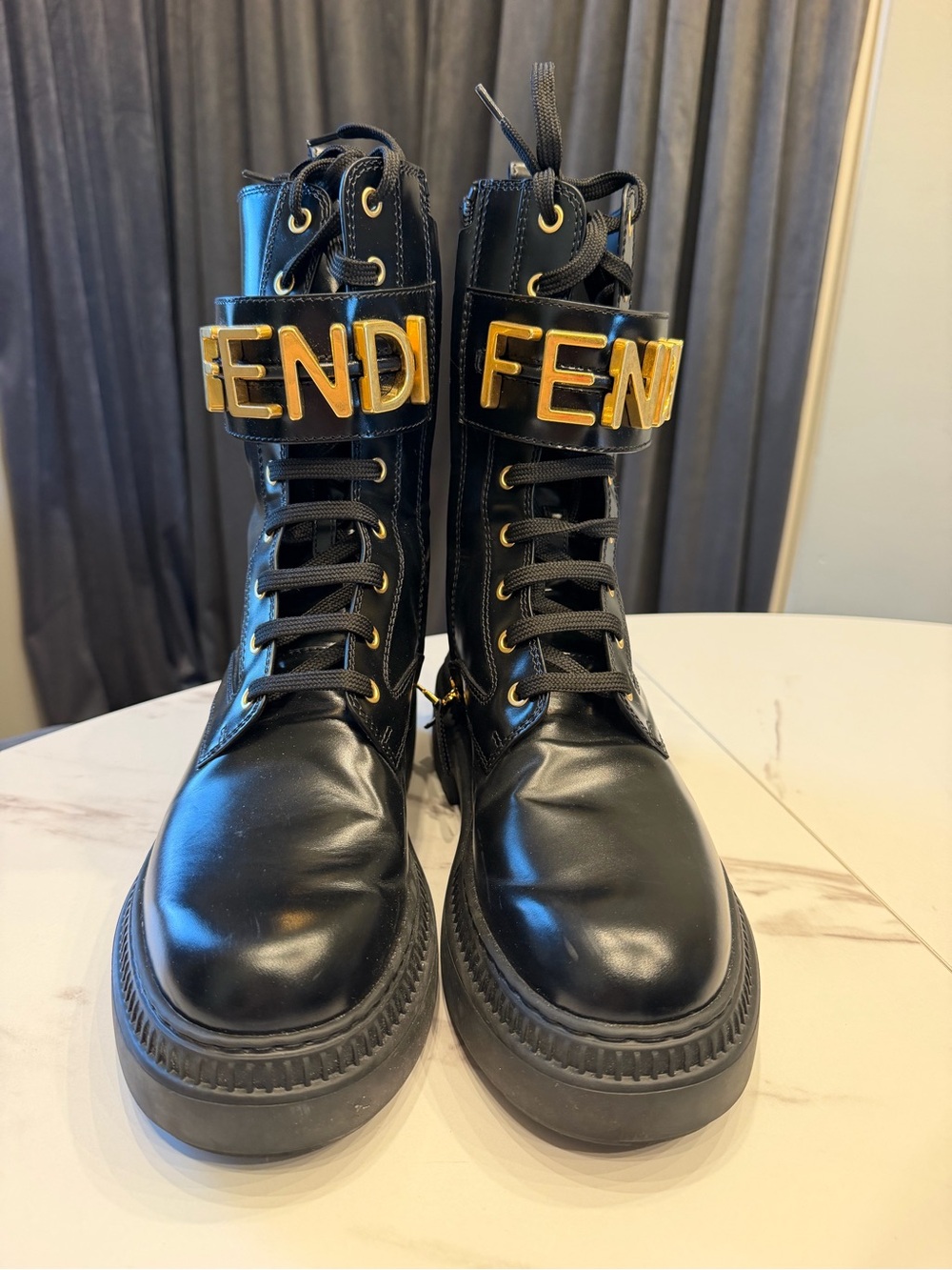 Fendi Black Leather Lace-Up Boots with Gold Logo Strap